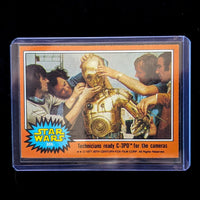 1977 Go Figment Topps Star Wars Orange Series 4 card showing technicians adjusting C-3PO on set numbered 306