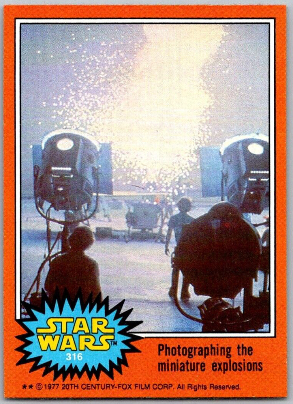 1977 Go Figment TOPPS Star Wars card 316 photographing miniature explosions with orange border series 4