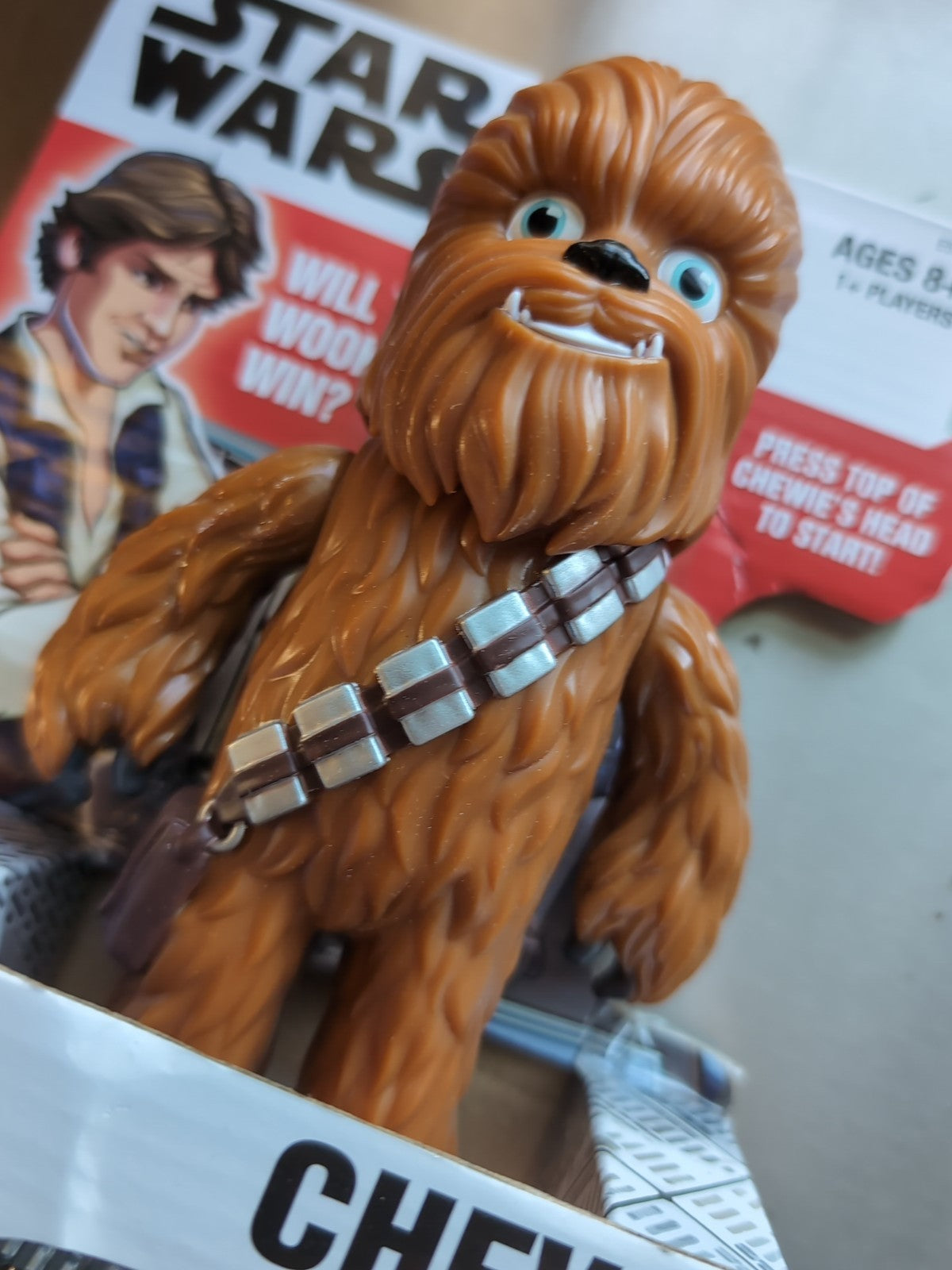 Hasbro Star Wars Chewbacca Bop It electronic game figure in packaging with character details visible