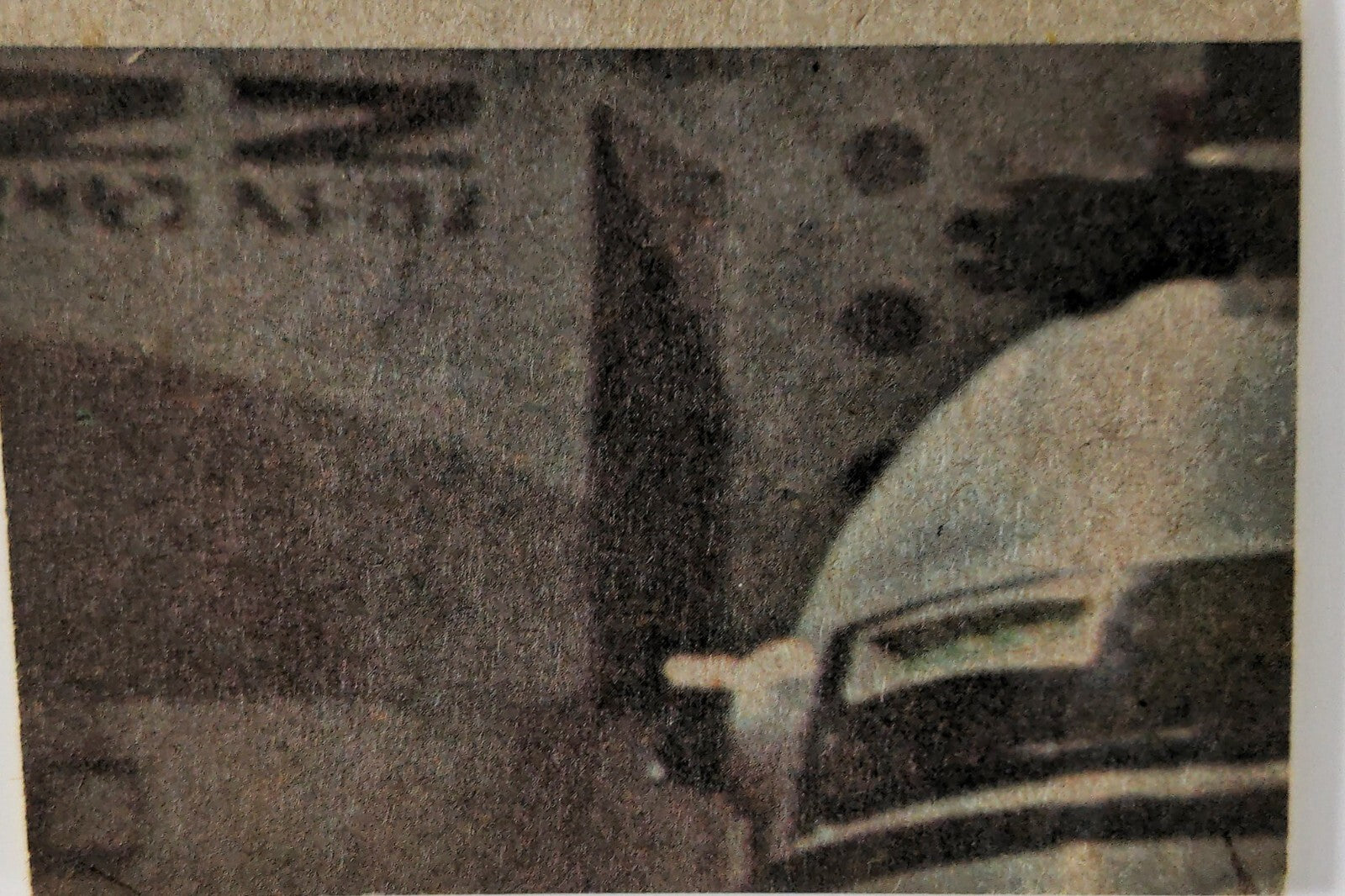 Close-up of 1977 Topps Star Wars Yellow Series 3 trading card featuring robot character detail