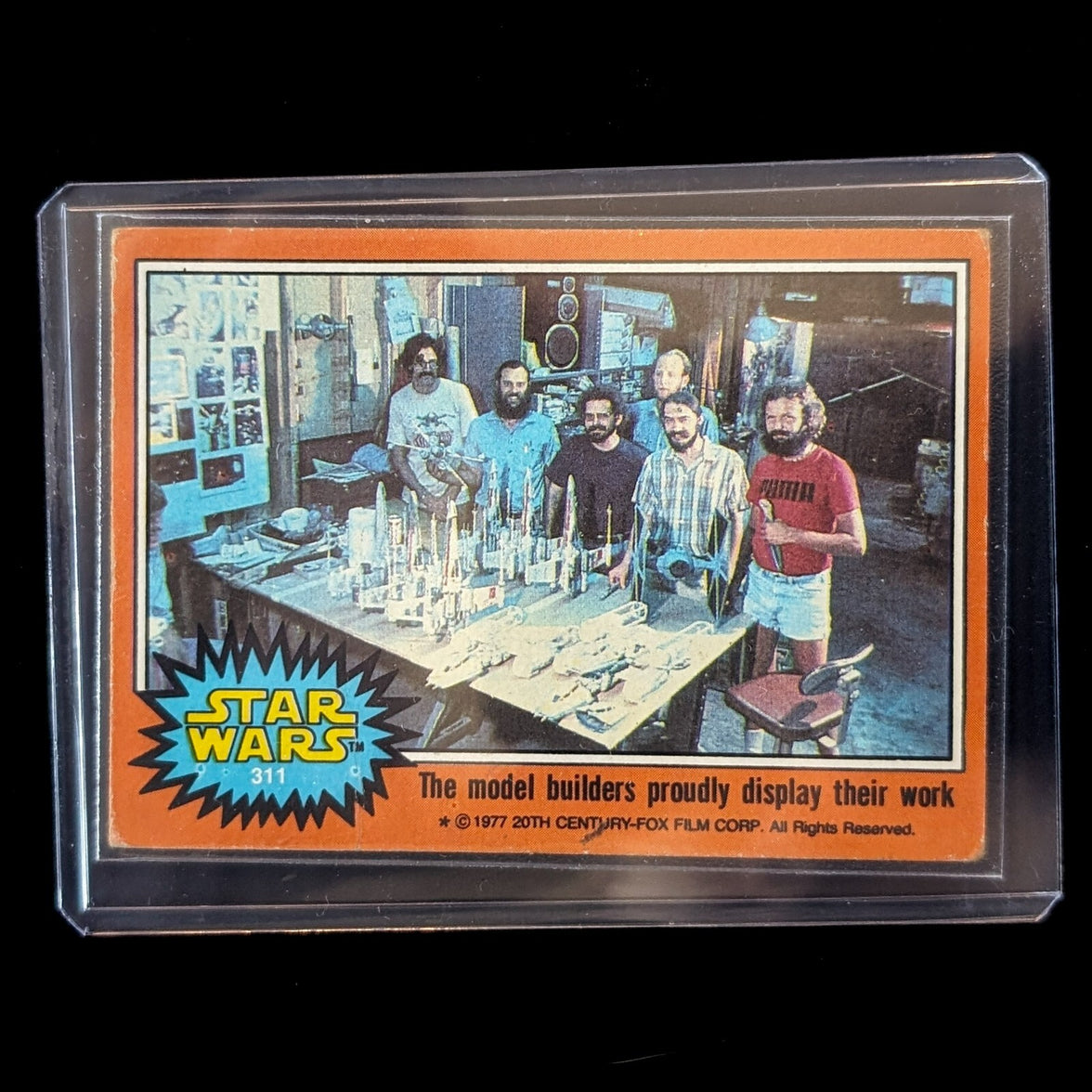 1977 TOPPS STAR WARS trading card Orange Series 4 Go Figment model builders display their work card number 311