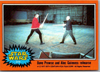 1977 TOPPS STAR WARS orange Series 4 card showing Dave Prowse and Alec Guinness rehearsing lightsaber fight Go Figment