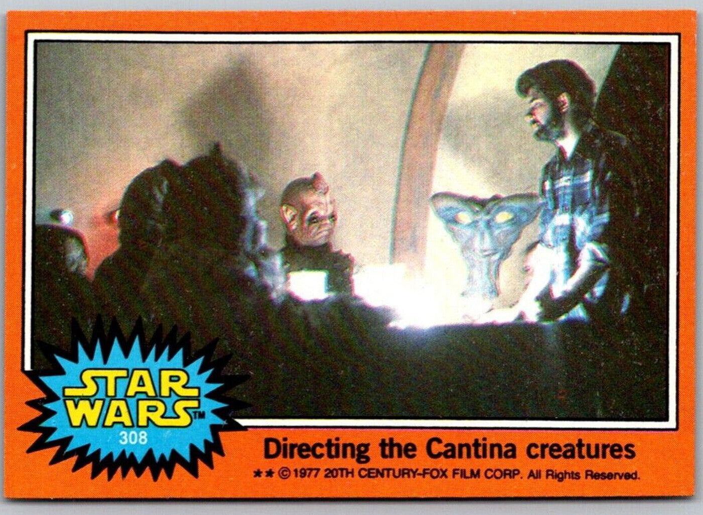 1977 Go Figment TOPPS Star Wars card 308 Directing the Cantina creatures with vintage orange border