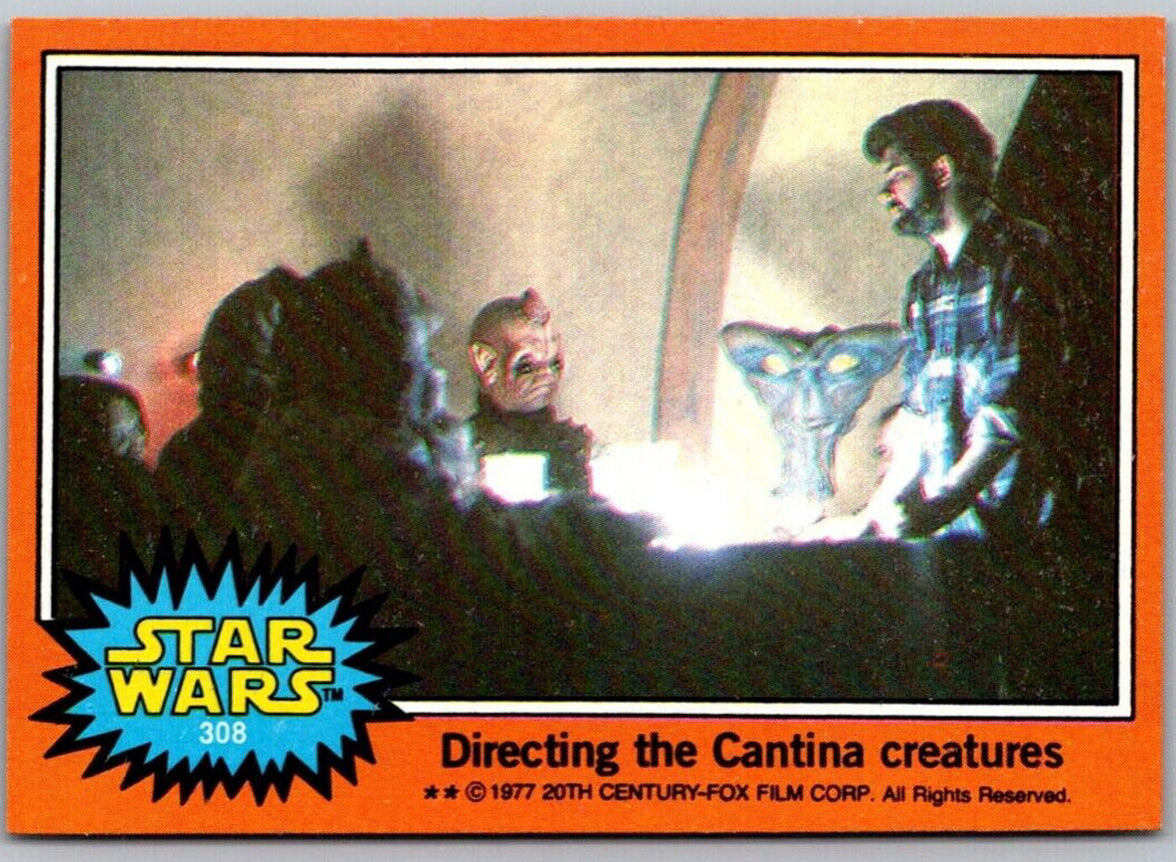 1977 Go Figment TOPPS Star Wars card 308 Directing the Cantina creatures with vintage orange border