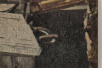 Partial close-up of 1977 Topps Star Wars Trading Card from Yellow Series 3 showing dark detailed background elements