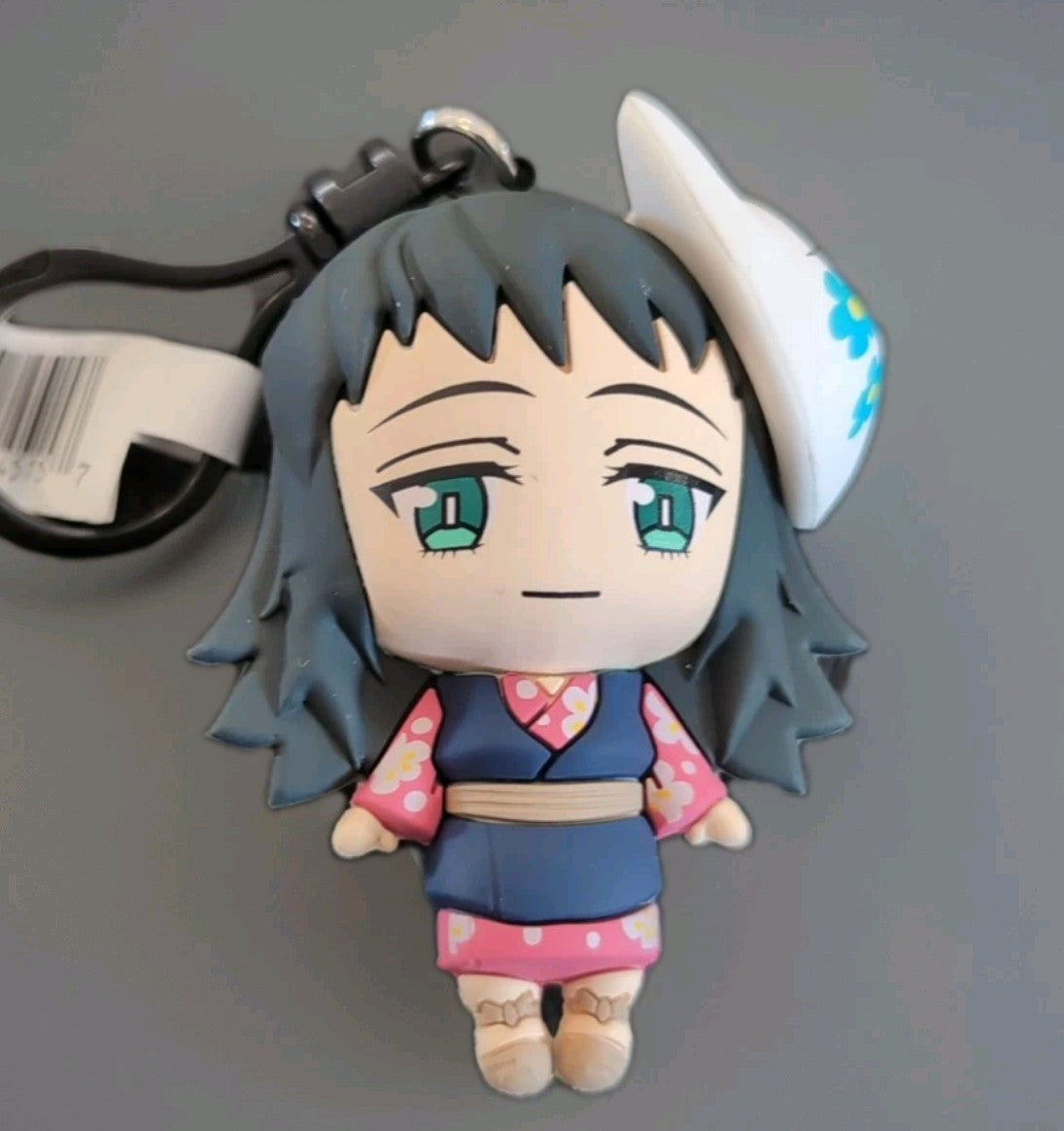 Monogram Kimetsu no Yaiba anime keychain featuring 3D foam PVC character with clip and black strap accessory.