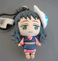 Monogram Kimetsu no Yaiba anime keychain featuring 3D foam PVC character with clip and black strap accessory.