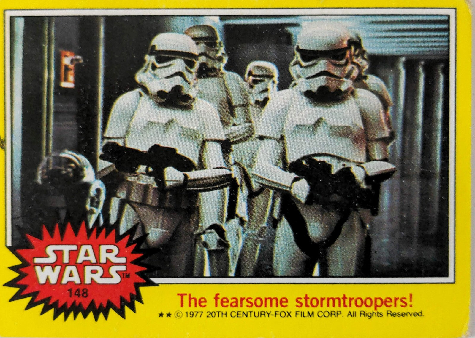 1977 Topps Star Wars trading card featuring stormtroopers with blaster rifles in yellow border Series 3