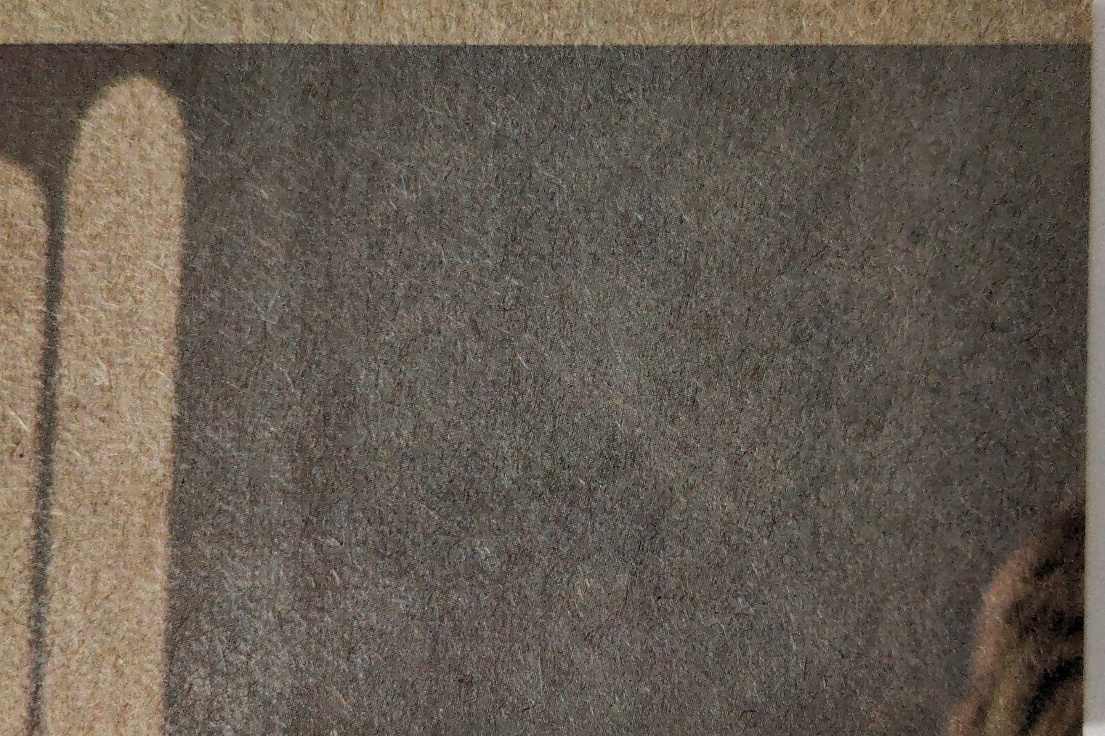 1977 Topps Star Wars yellow Series 3 trading card corner detail on textured surface