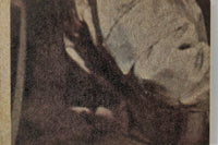 Close-up view of vintage 1977 Topps Star Wars yellow Series 3 trading card corner texture and design detail