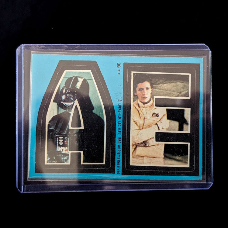 Vintage 1980 Topps Empire Strikes Back sticker with Darth Vader and Princess Leia, from Go Figment collection