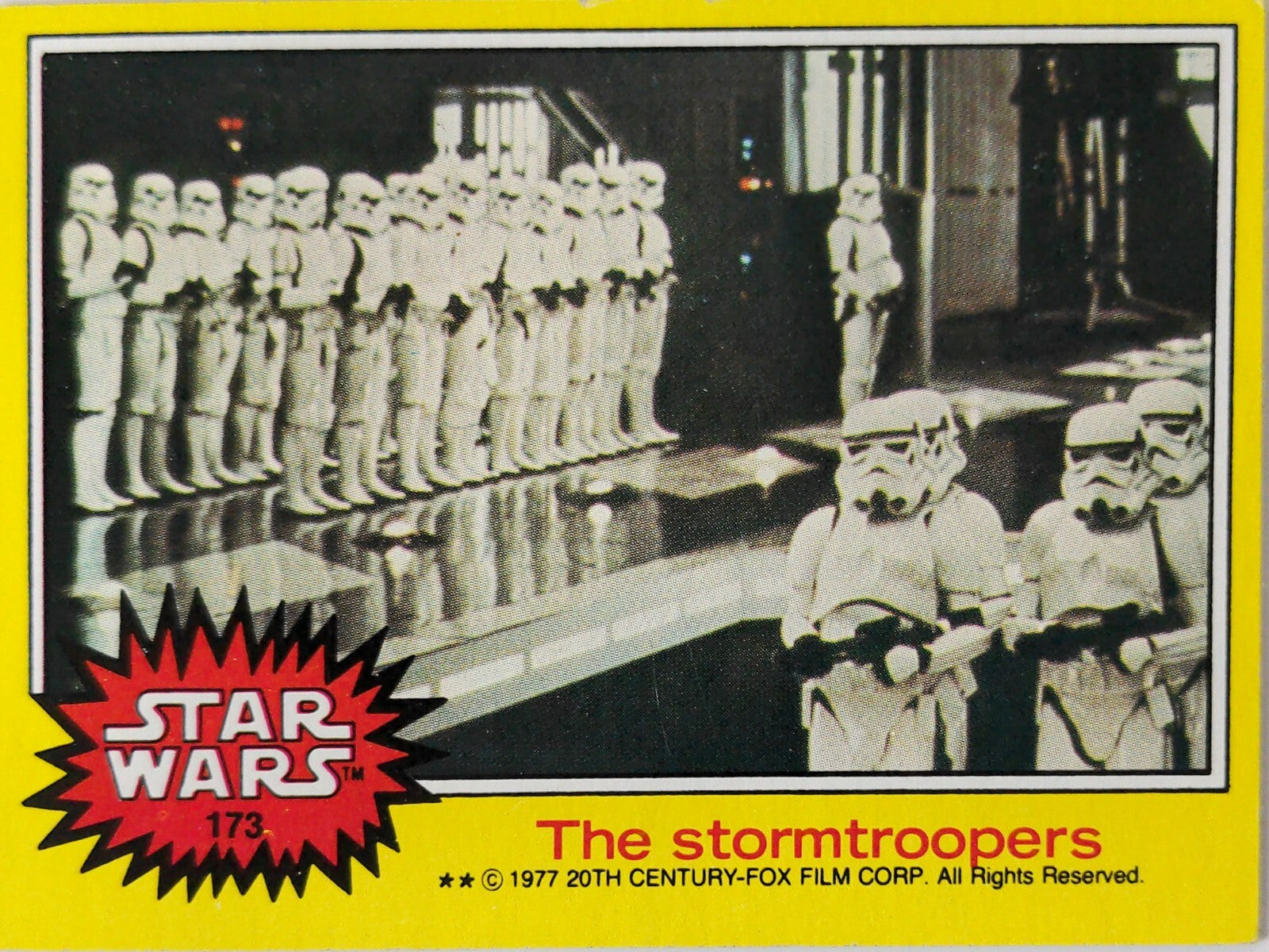 1977 Topps Star Wars yellow Series 3 trading card featuring stormtroopers in formation on glossy card