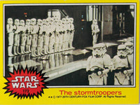 1977 Topps Star Wars yellow Series 3 trading card featuring stormtroopers in formation on glossy card