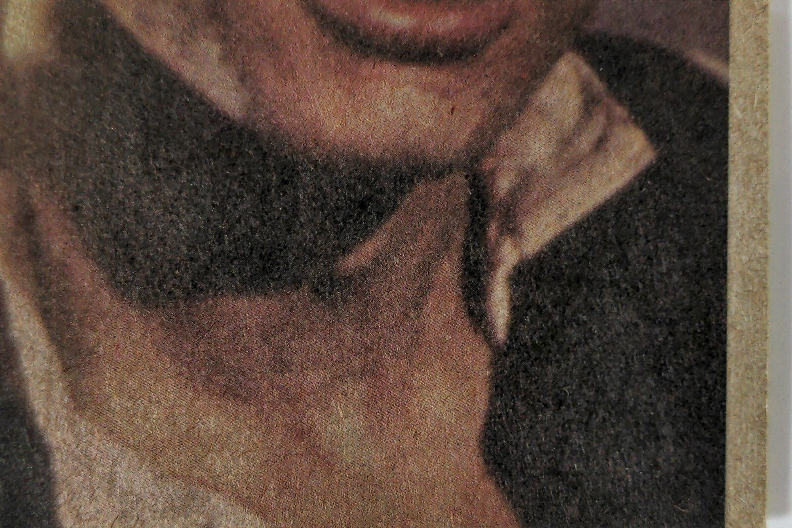 Close-up of 1977 Topps Star Wars YELLOW Series 3 trading card corner with visible character details and aged texture
