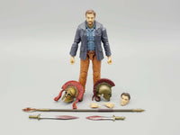 Action figure with accessories on a gray background
