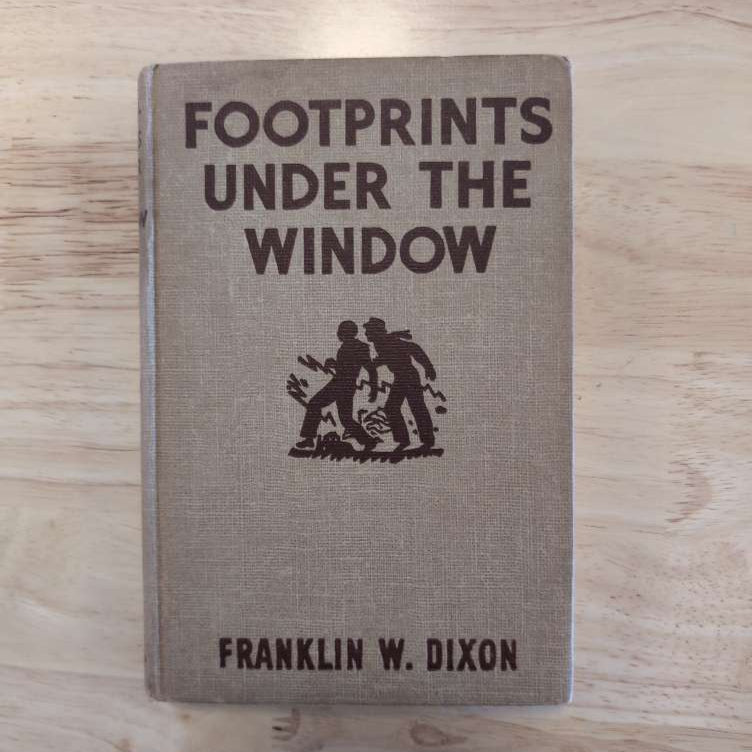 Vintage hardcover edition of 12 Footprints Under the Window by Franklin W. Dixon from Grosset & Dunlap, Inc.