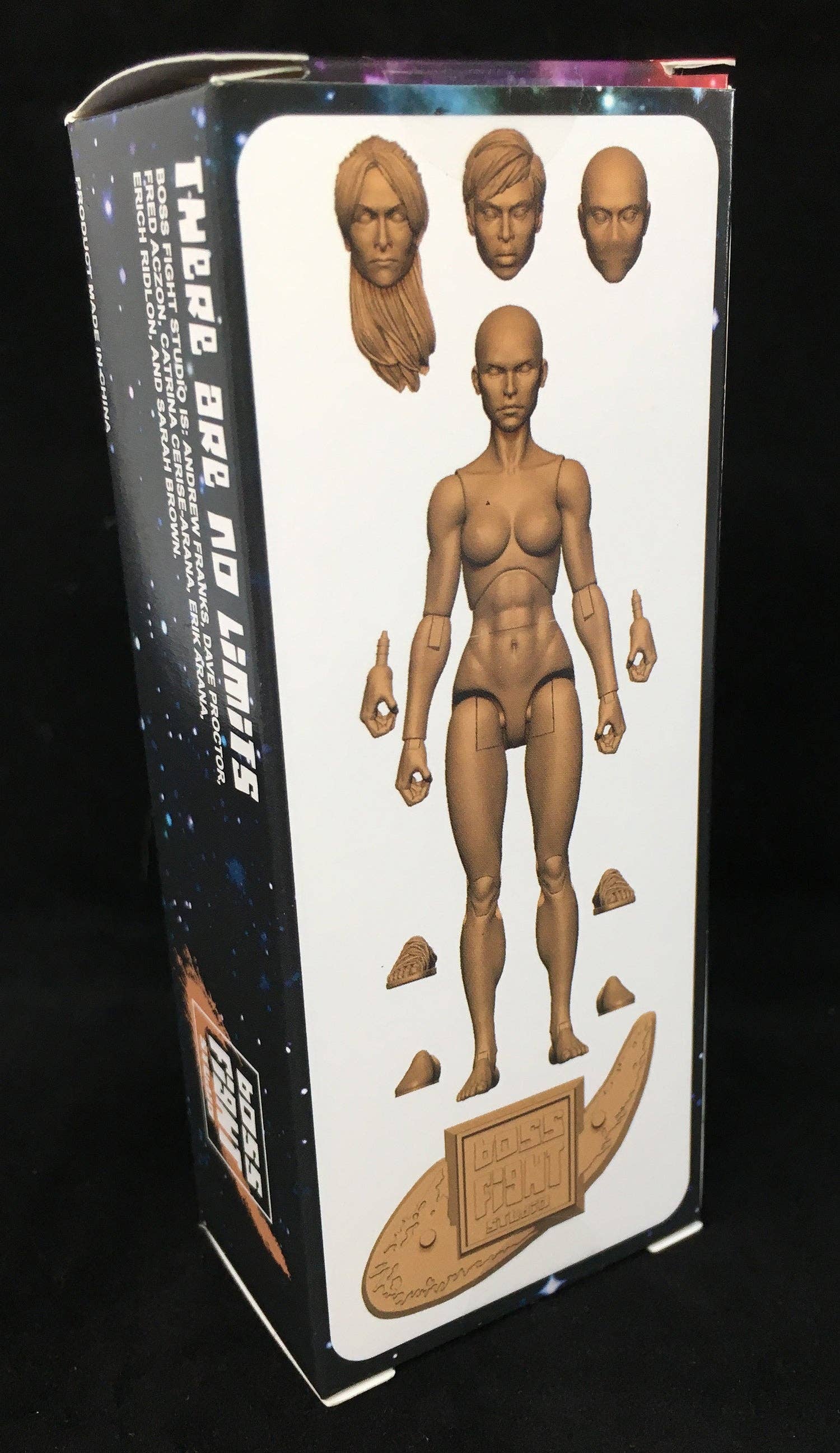 Unpainted articulated female figure with three distinct head sculpts, extra hands, feet parts, and a textured display base on black background