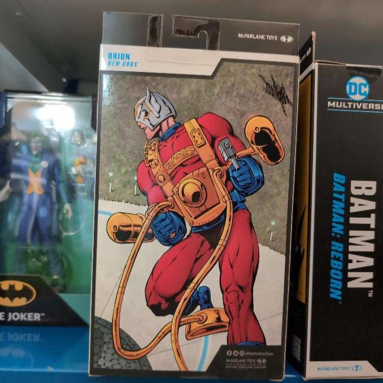 McFarlane Toys Orion New Gods action figure box art with detailed comic illustration in packaging display