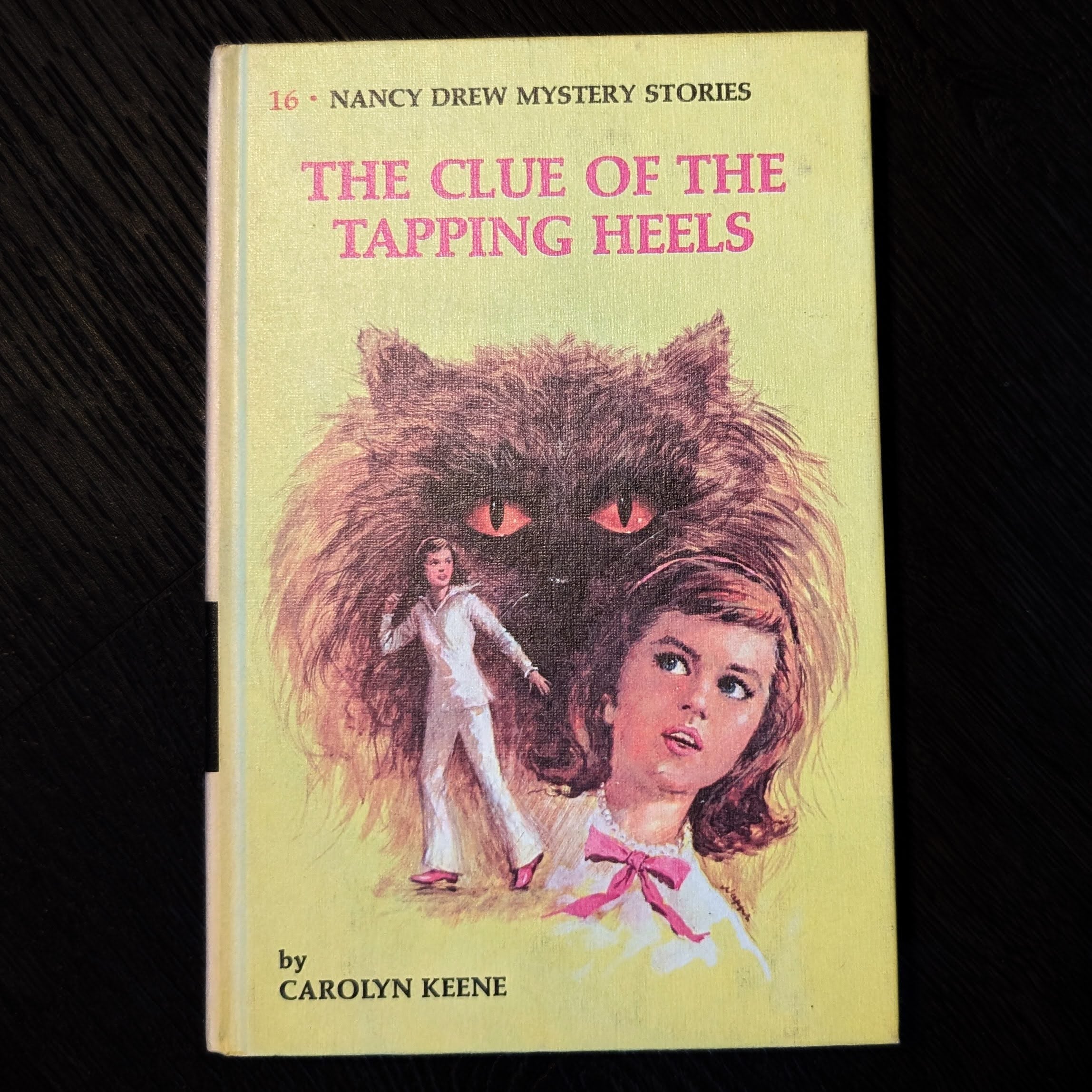 Hardcover Nancy Drew book The Clue of the Tapping Heels 1969 edition by Carolyn Keene Grosset & Dunlap Inc.