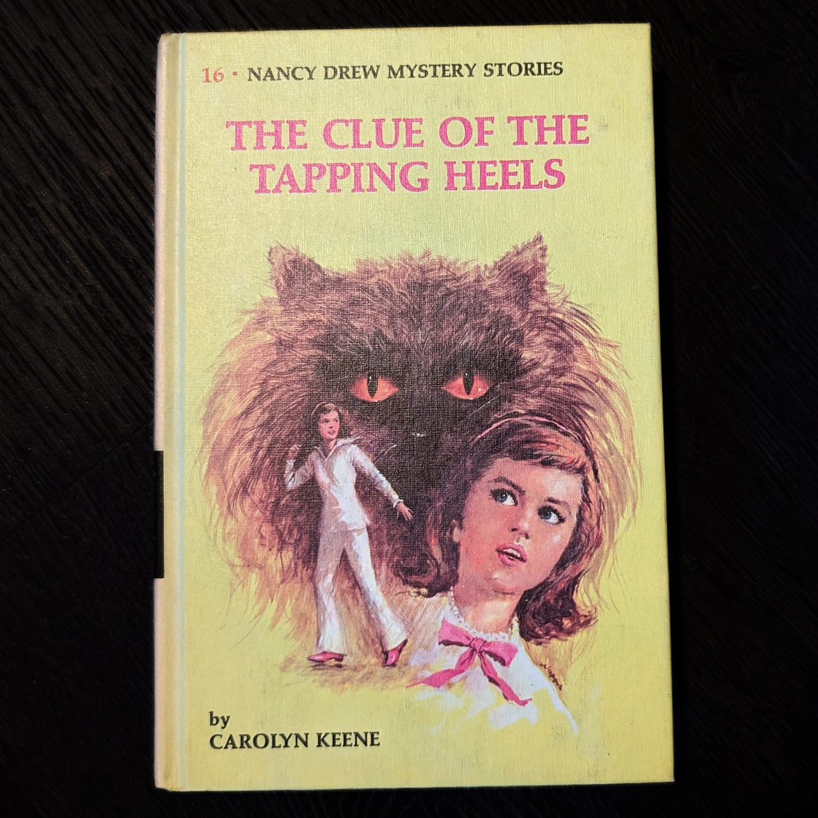 Hardcover Nancy Drew book The Clue of the Tapping Heels 1969 edition by Carolyn Keene Grosset & Dunlap Inc.