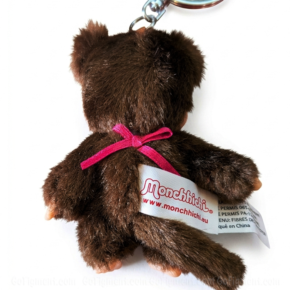 4" Monchhichi Keychain - Classic Girl with Pig Tails Mascot - Authentic Plush Mascot, NWT showing plush back with pink bow and tag