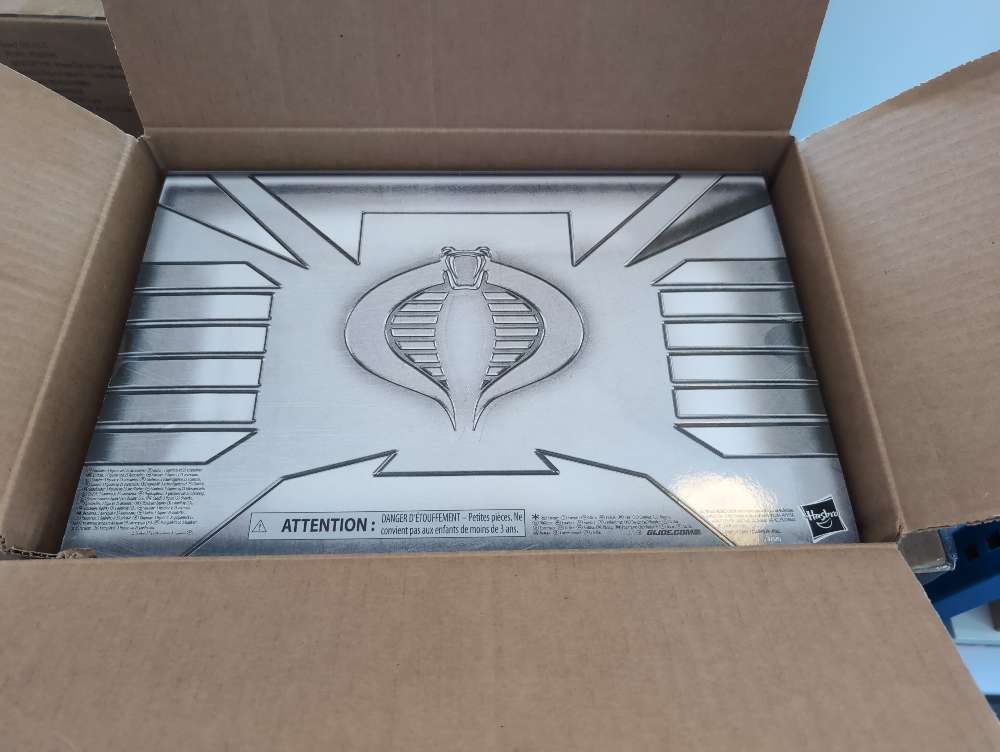 Hasbro GI Joe Classified Series COBRA 3 Pack box inside shipping carton showing silver logo and attention label detail