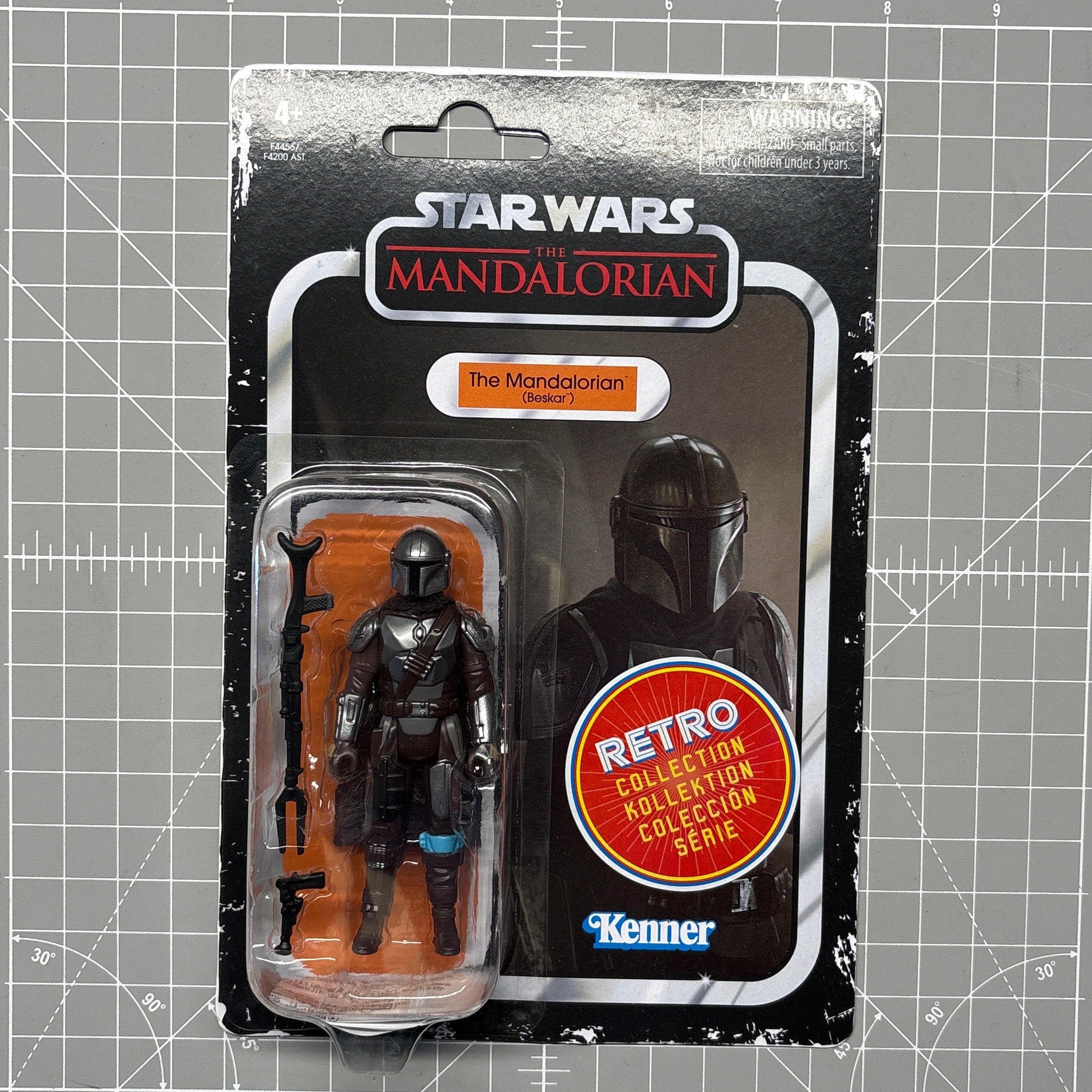 Mandalorian Beskar Star Wars Retro Collection Action Figure in case MANDO by Kenner in blister packaging