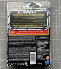 Back of Star Wars action figure packaging with character names, multilingual text, barcode, and warning labels