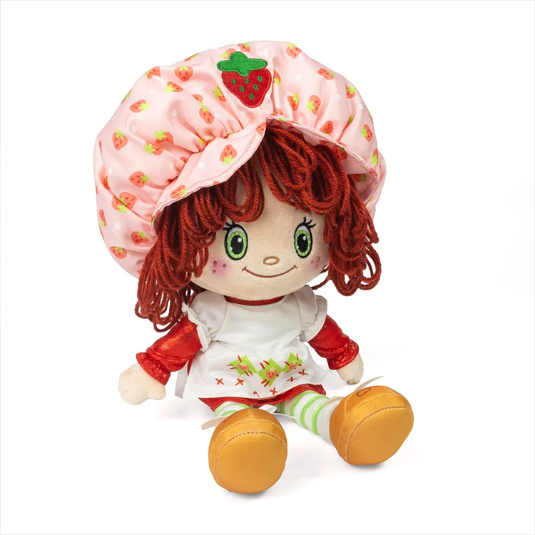 Strawberry Shortcake plush doll with soft yarn hair and strawberry hat by Loyal Subjects sitting on white background