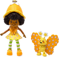 Boss Fight Studio Llc Orange Blossom classic figure with curly hair, yellow dress, striped green socks, and butterfly companion accessory