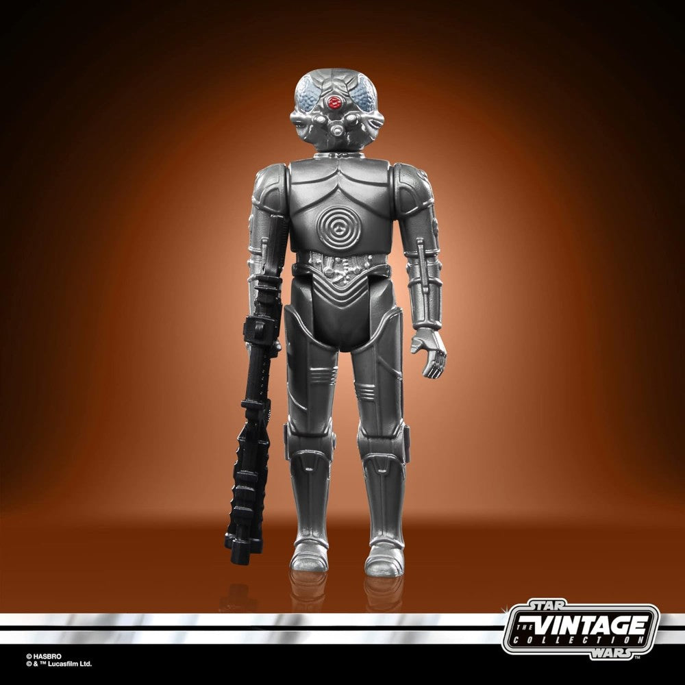 Kenner Star Wars Retro Collection Zuckuss 3.75-inch action figure with blaster posed on brown background