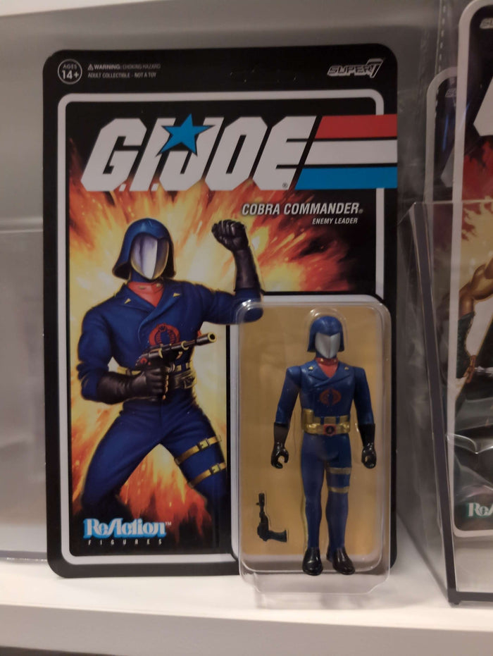 GI Joe Cobra Commander action figure in blue dress uniform with helmet and weapon in Super7 retro style packaging