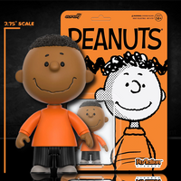 Franklin Peanuts 3.75 inch action figure by Super7 in orange shirt with striped pants in branded packaging