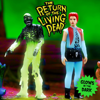 Return of the Living Dead Trash glow-in-the-dark action figure with red-haired female figure by Super7 on green background