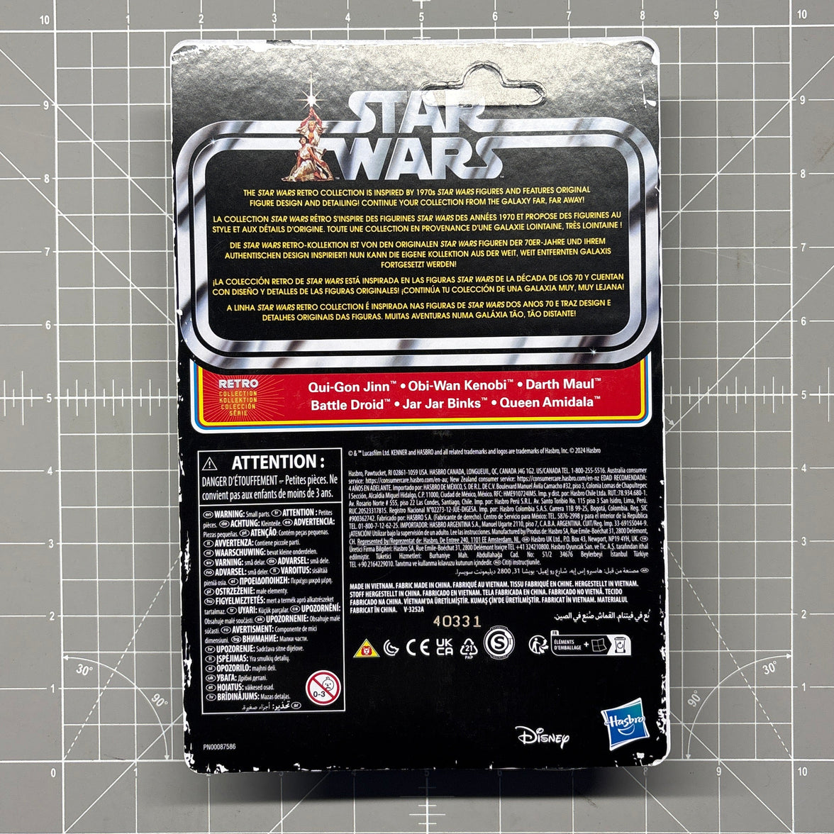 Qui-Gon Jinn Star Wars Retro Collection Action Figure in case by Kenner, back of packaged collectible