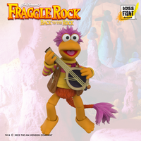 Boss Fight Studio Llc Fraggle Rock Gobo figure with purple hair, striped sleeves, guitar, and satchel on cave background