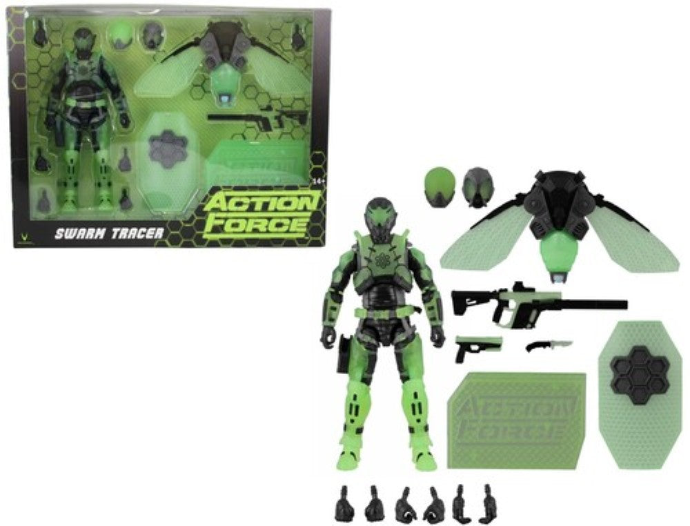Green Swarm Tracer action figure with wings, weapons, and accessories beside its box
