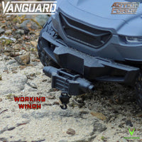 Blue off-road vehicle front with winch on rocky terrain, featuring Vanguard and Action Force logos and Working Winch text