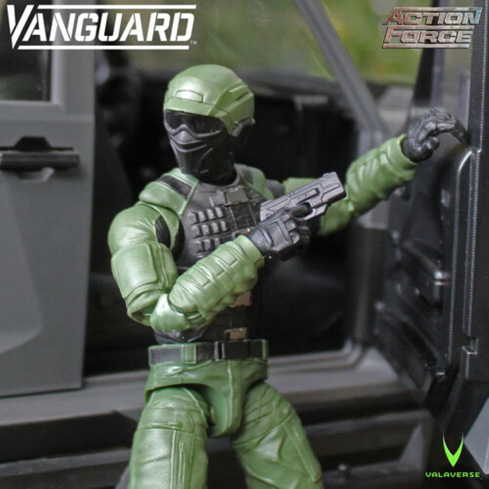 Green masked Vanguard Action Force figure holding a rifle inside a vehicle doorway