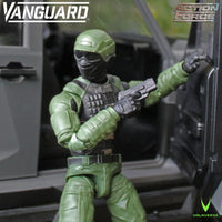 Green masked Vanguard Action Force figure holding a rifle inside a vehicle doorway