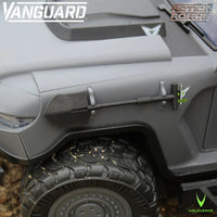 Close up of a gray off road toy vehicle with a rugged tire and Vanguard and Action Force logos