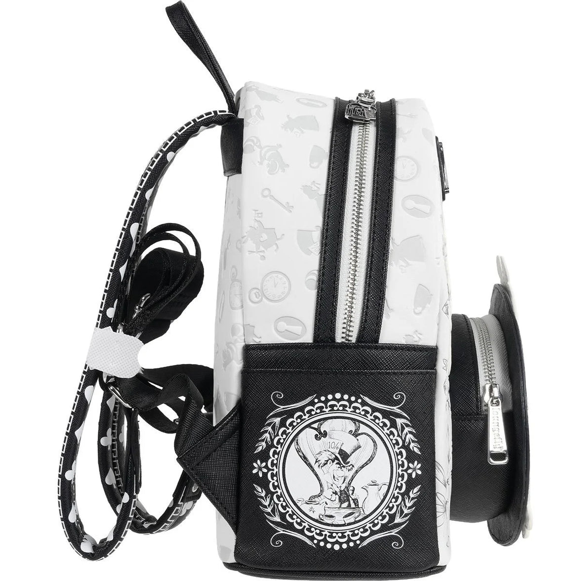 Side view of a small backpack with black and white design and a circular character emblem on the front pocket.
