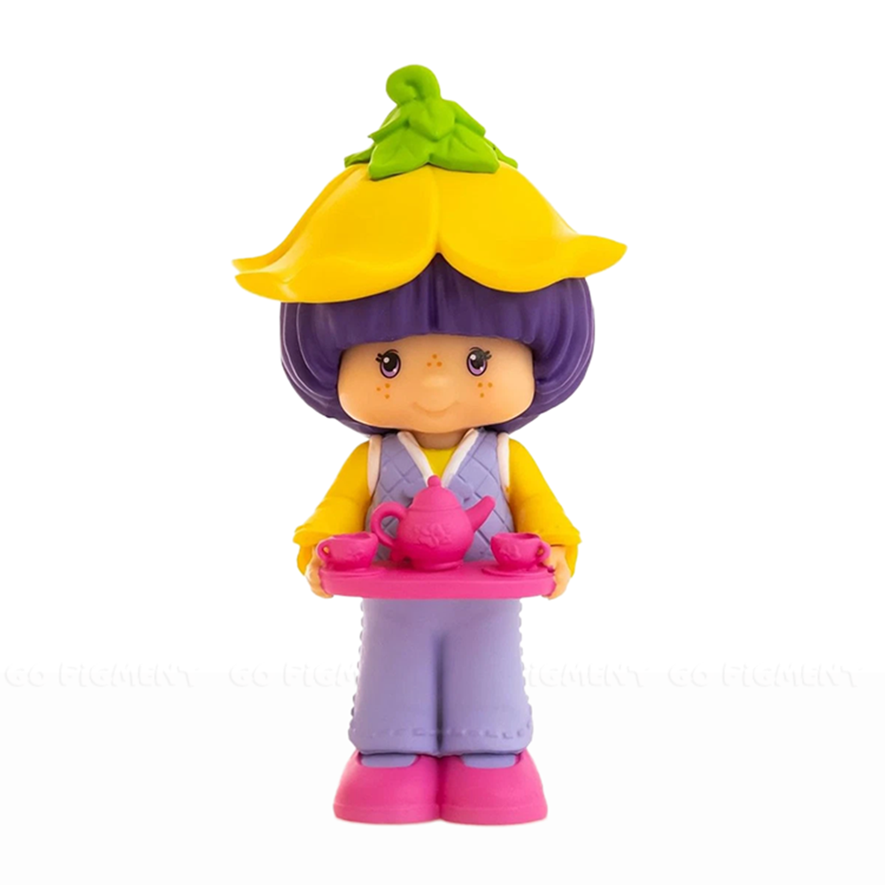 Almond Tea Strawberry Shortcake 2.5" Cheebee Figure by Loyal Subjects holding a pink tea set in purple and yellow attire