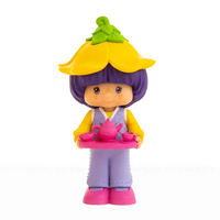 Almond Tea Strawberry Shortcake 2.5" Cheebee Figure by Loyal Subjects holding a pink tea set in purple and yellow attire