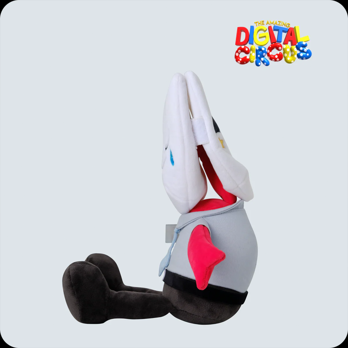 Soft plush figure of Gangle from The Amazing Digital Circus with large white ears and red arms sitting upright