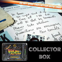 Close-up of handwritten time travel letter with 1985 warning and Back to the Future collector box by Doctor Collector