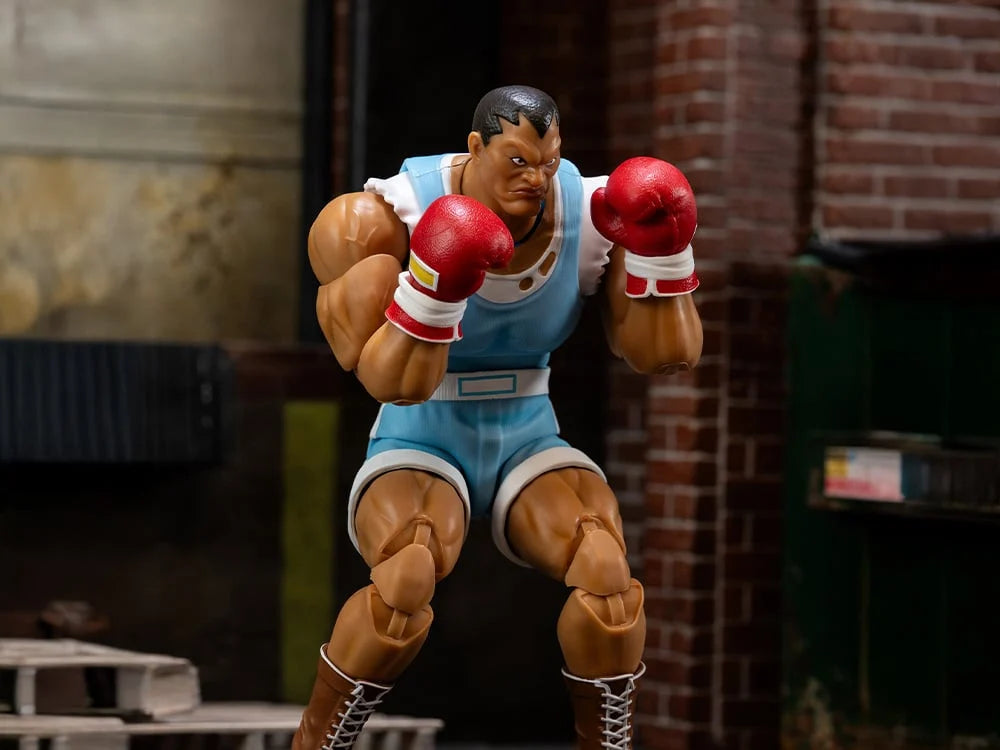 Ultra Street Fighter II Balrog 6-Inch Scale Deluxe Action Figure - The Ruthless Enforcer by Jada Toys posed with boxing gloves new in box