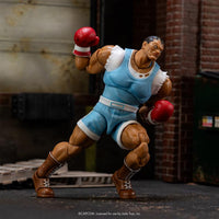 Ultra Street Fighter II Balrog 6-Inch Scale Deluxe Action Figure - The Ruthless Enforcer by Jada Toys posed in boxing stance new in box