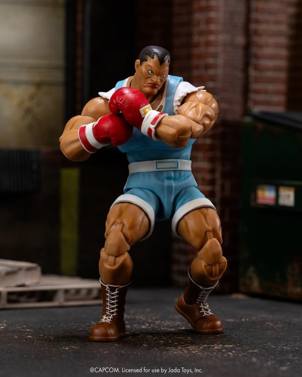 Ultra Street Fighter II Balrog 6-Inch Scale Deluxe Action Figure - The Ruthless Enforcer by Jada Toys posed with boxing gloves new in box