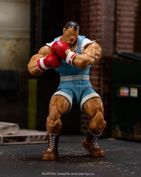 Ultra Street Fighter II Balrog 6-Inch Scale Deluxe Action Figure - The Ruthless Enforcer by Jada Toys posed with boxing gloves new in box